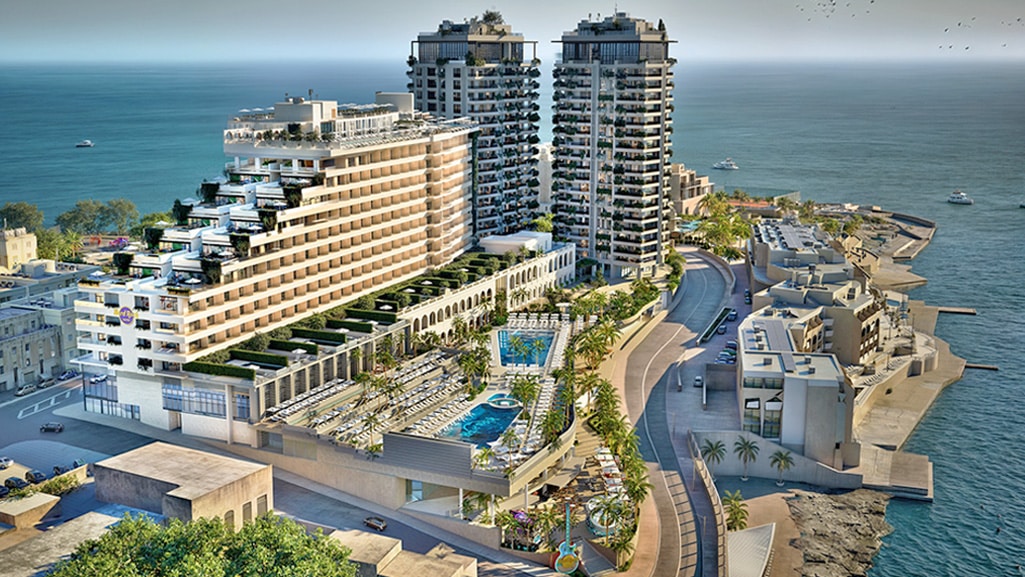 Hard Rock Hotel Malta overlooking St. George's Bay, featuring bespoke joinery, custom-built furniture and door solutions by Construct Furniture.